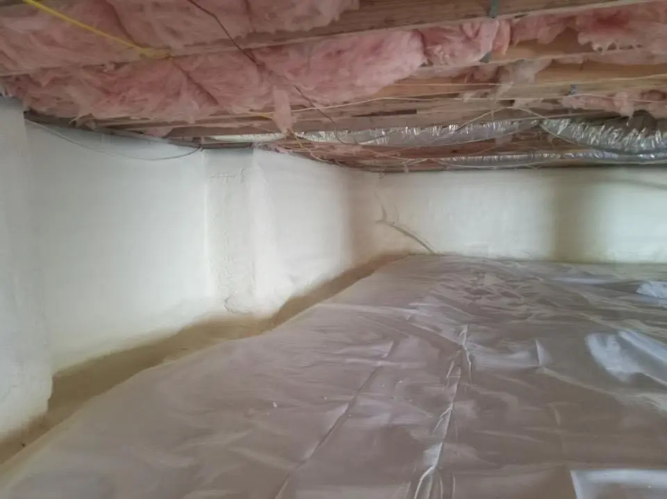 Crawl space encapsulation with closed-cell spray foam for Commercial Roof Restoration in Ashburnham